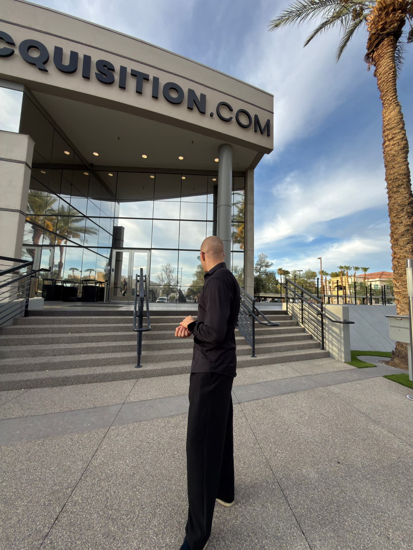 Ronaldas outside Acquisition.com